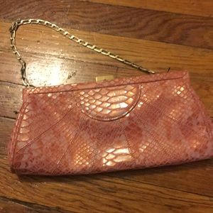 Pink snakeskin clutch